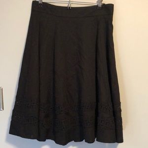 Black skirt. Size 8. Cute lace detail at bottom. Double lined.